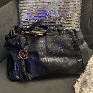 Embossed leather handbag. Fair used condition.